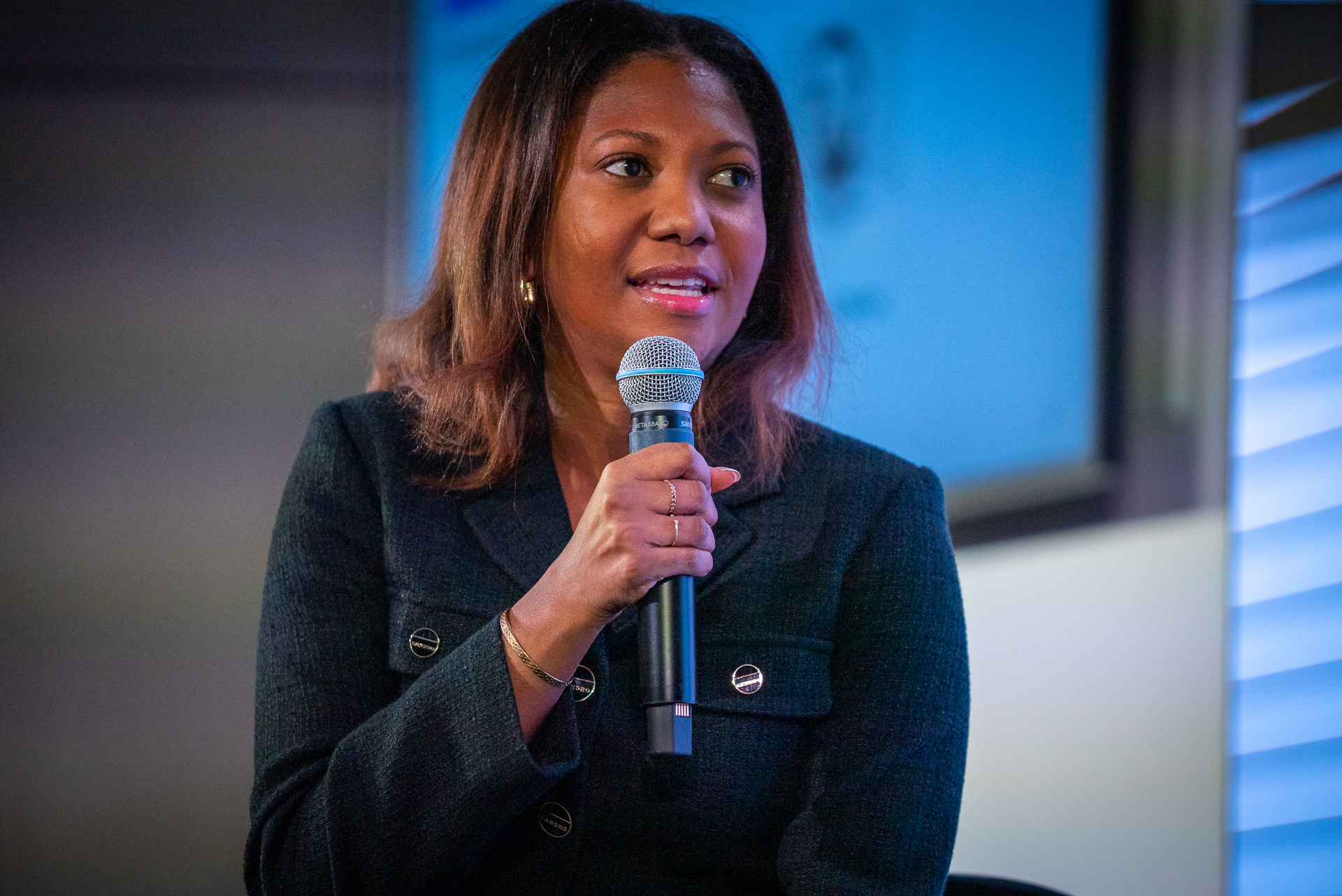 Christelle speaking on a panel